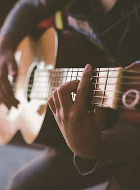 Playing Acoustic Guitar