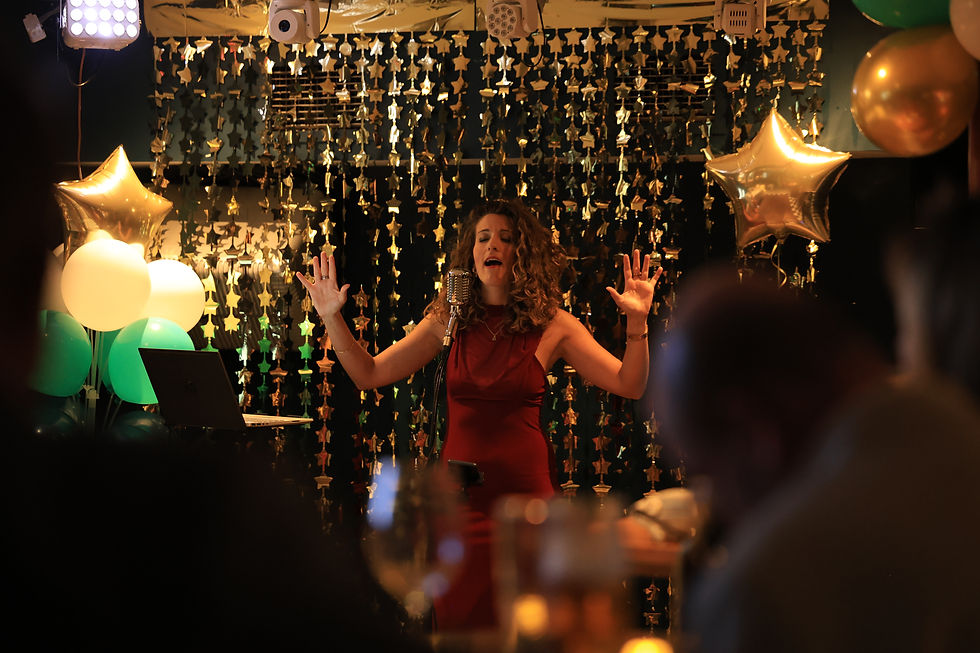 Live singer performer singing at She Who Fell Book Launch and Live Music Experience - Portsmouth Jun