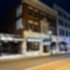 Historic building beautifully lit at night time