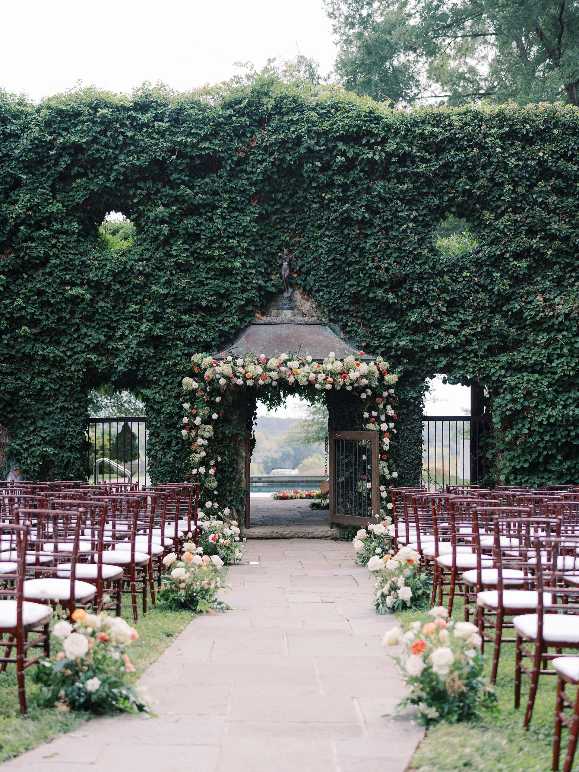 Goodstone Inn wedding ceremony at Ivy wall