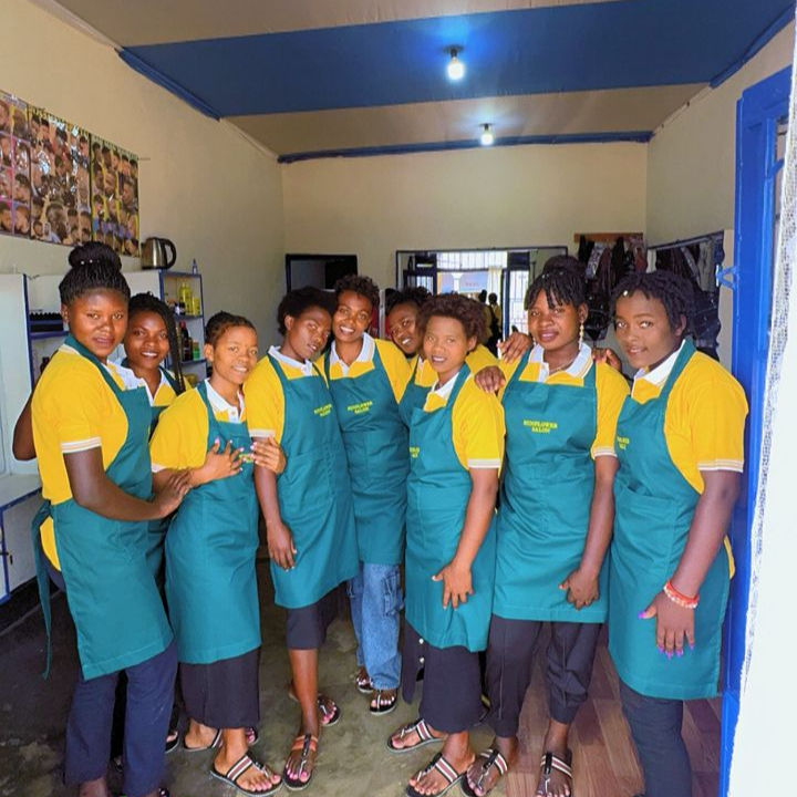 Belyse with her colleagues at their salon