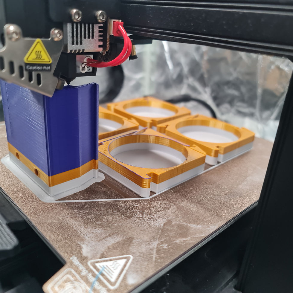 A 3D printer creating an orange model