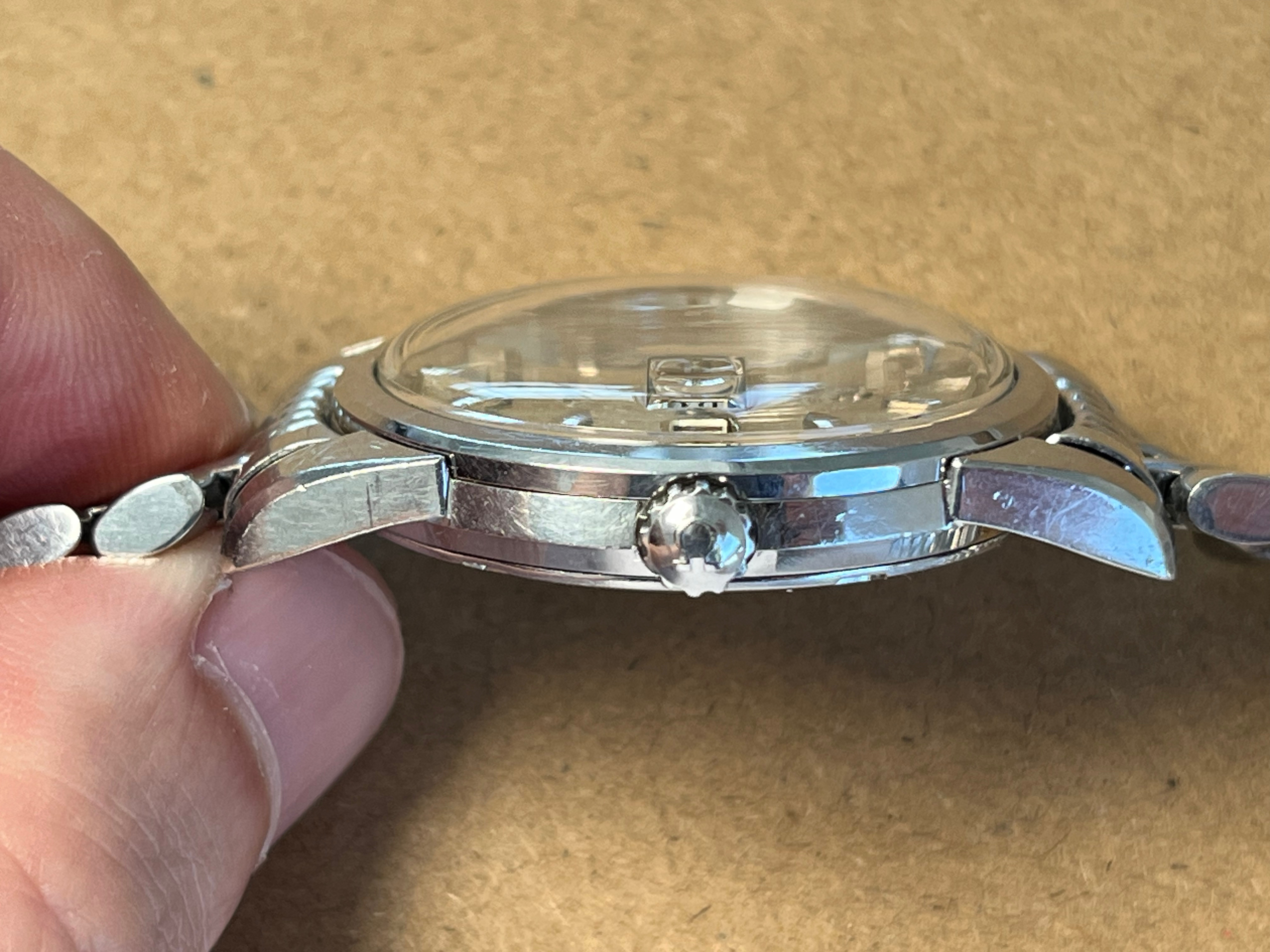 Omega Seamaster 166.009. Crown-side profile. · Photo: Tempo Prima · © Tempo Prima; permission not yet confirmed · Source: https://www.tempoprima.com/product-page/vintage-1963-omega-seamaster-serviced-special-ribbion-dial