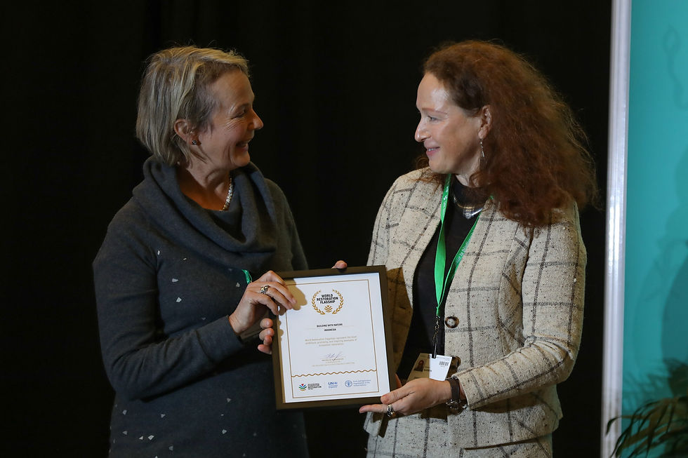 Wetlands International CEO Jane Madgwick receiving the World Flagship award certificate during Restoration Day at CBD COP15 in Montreal. © Wetlands International