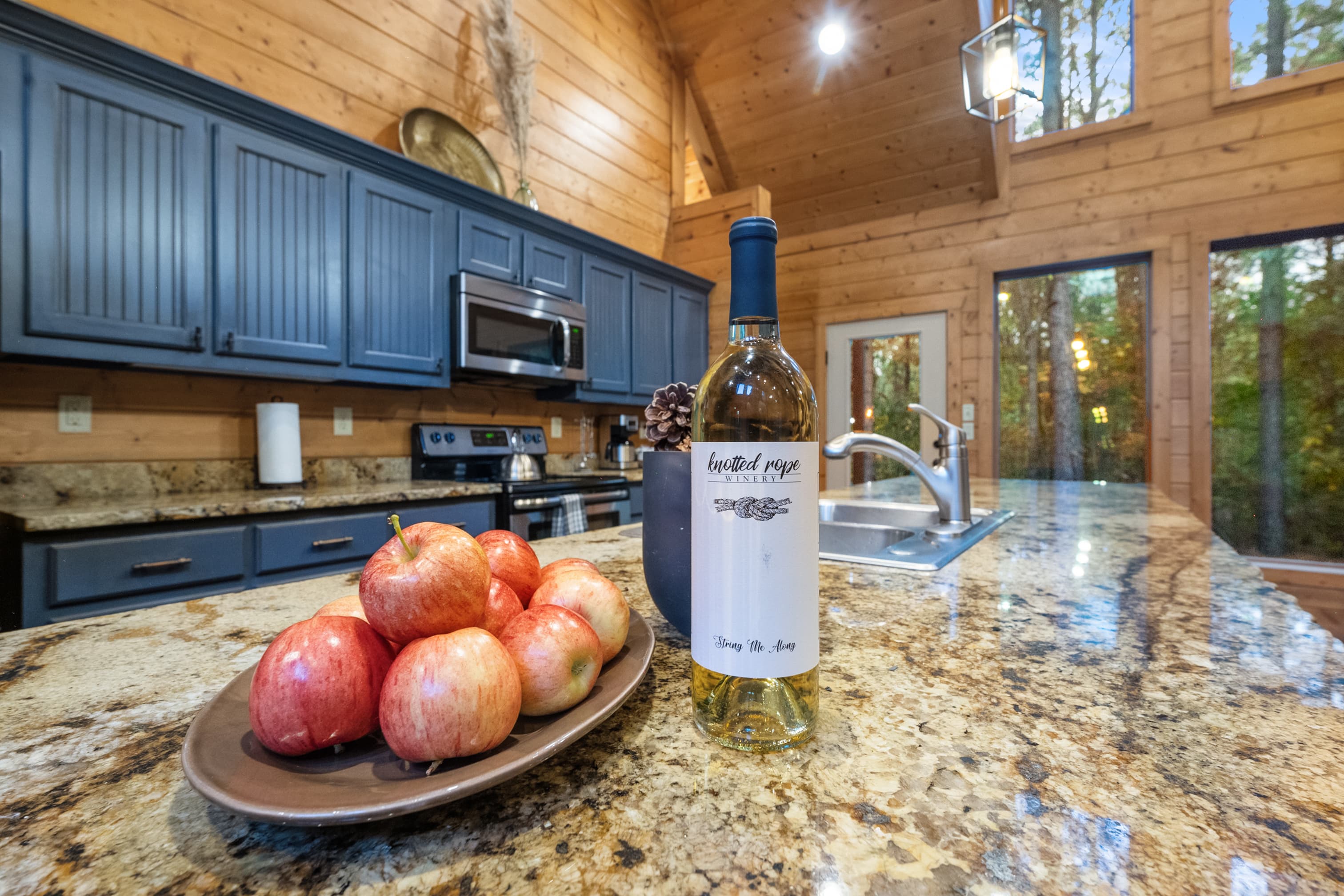 Luxury cabin kitchen with blue cabinets