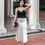 Thumbnail: Stolen Moments Satin Pleated Peplum Top (BLACK)