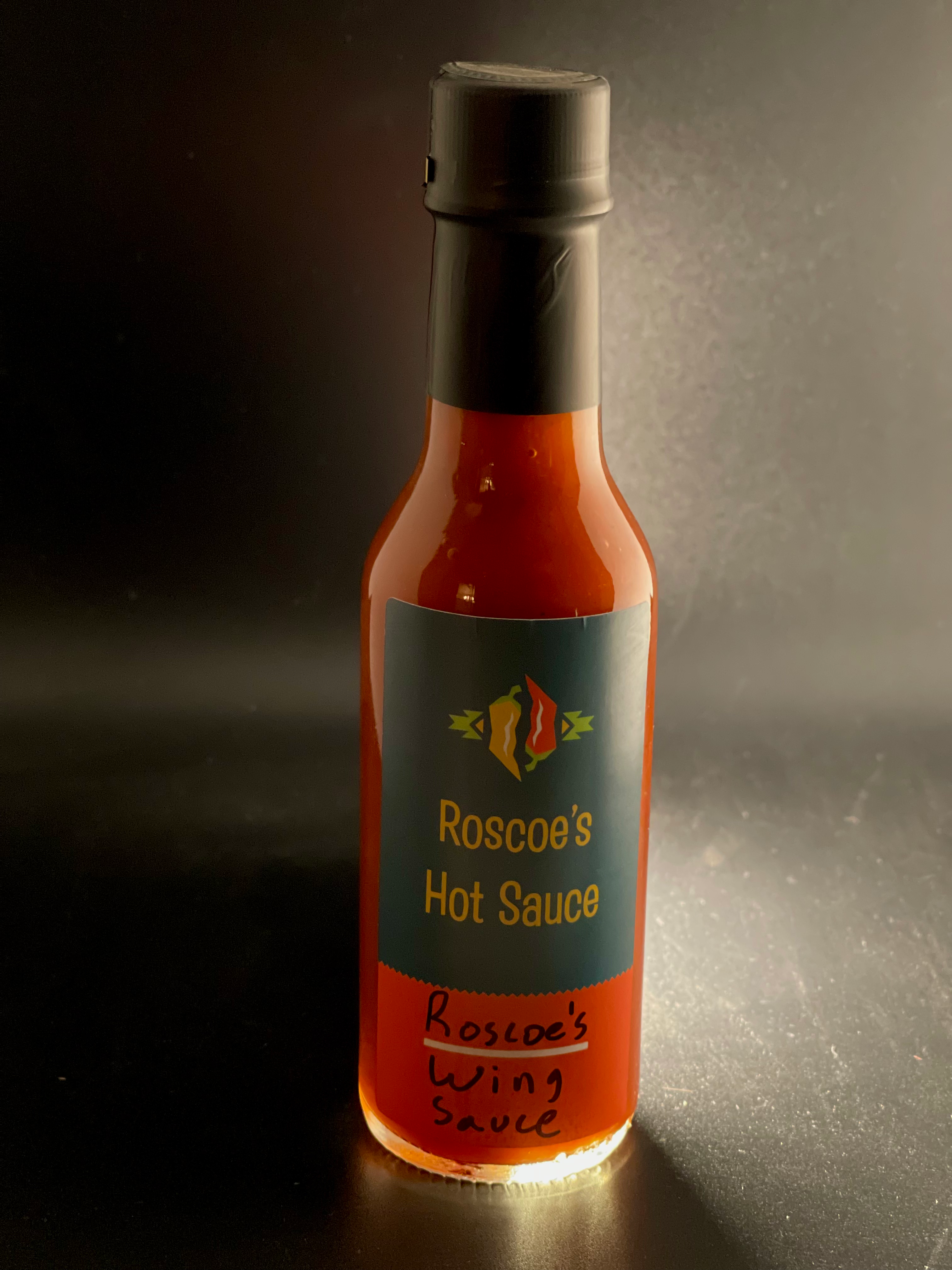 Bottle of roscoe's wing sauce. small