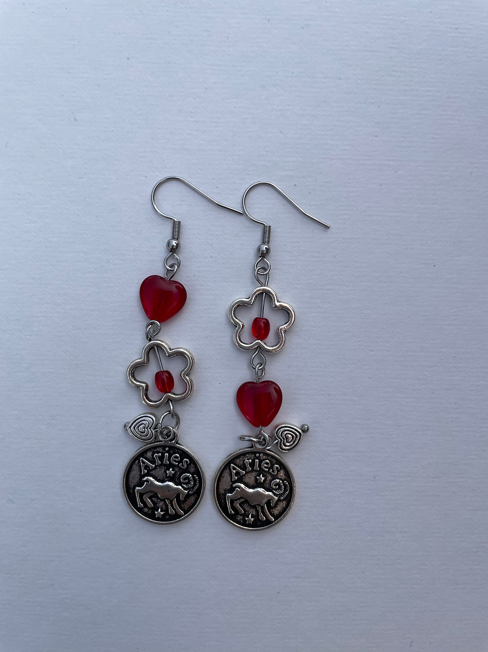 Thumbnail: zodiac earrings