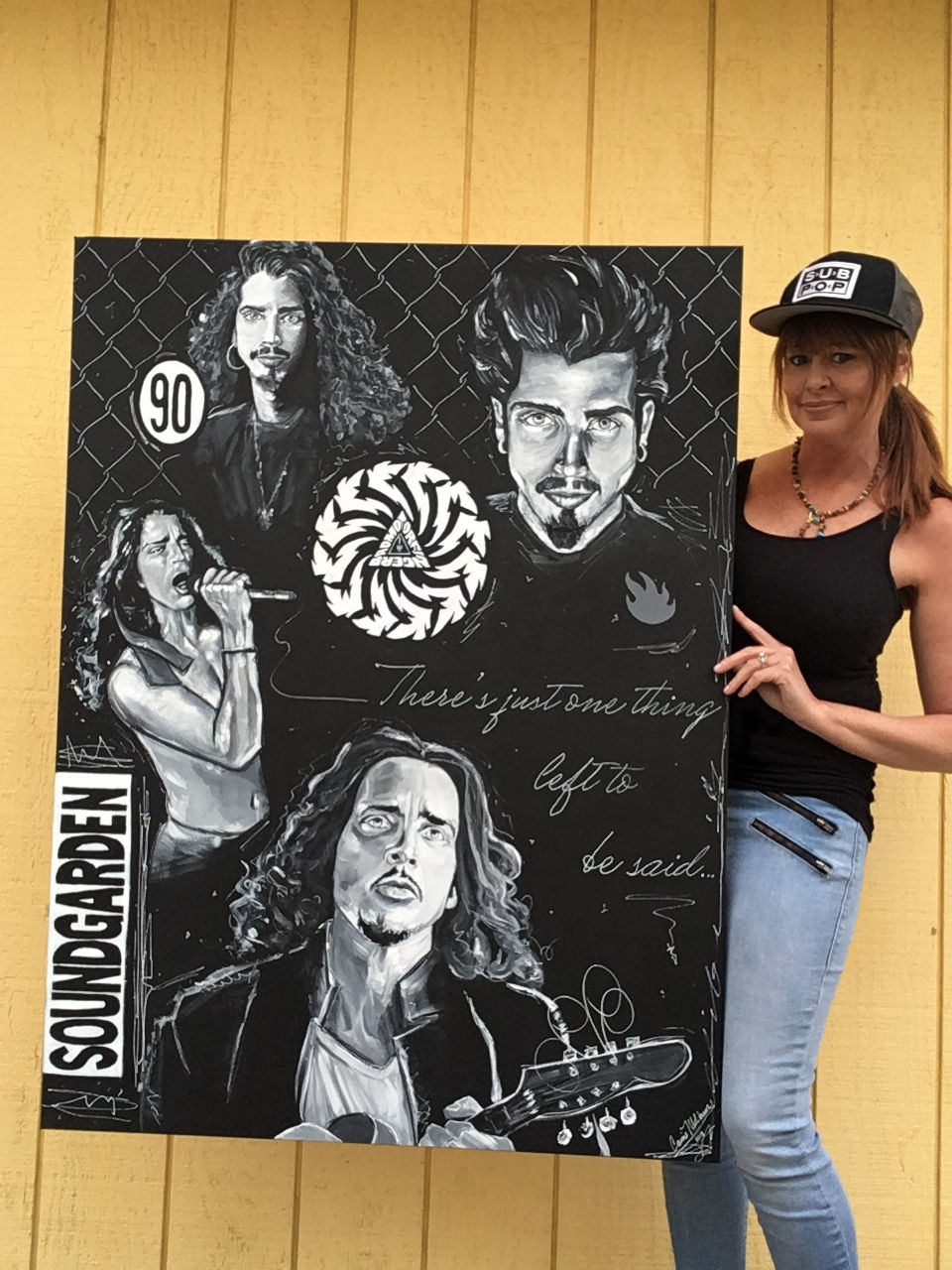 Artist Carrie Milburn with her Chris Cornell painting (collage). Acrylic painting 36"x48". Title: "Seasons"
www.CarrieMilburn.com