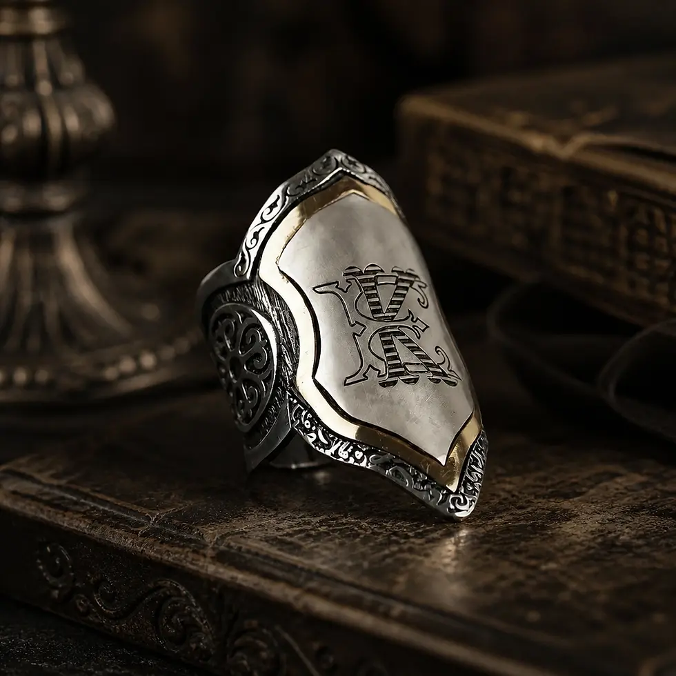 Detailed view of Custom Handcrafted Silver Archer Thumb Ring with Interlocking Monogram