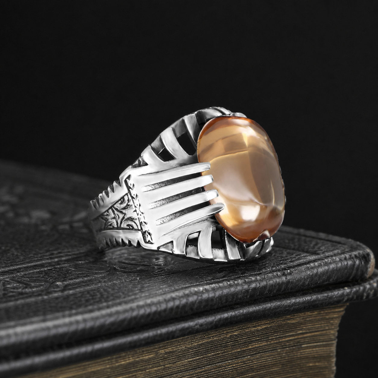 Champagne Citrine Architectural Sterling Silver Men's Ring on a black leather book