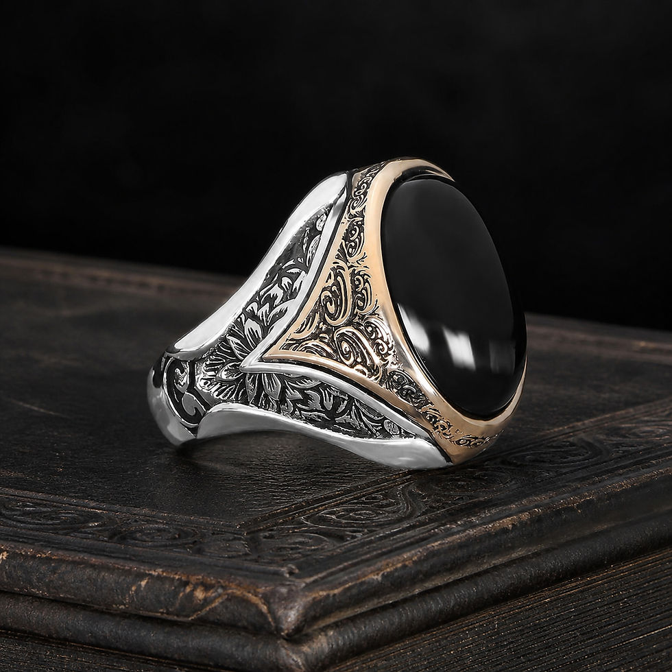 サムネイル： Two Tone Black Onyx Sterling Silver Men's Ring on a black leather book