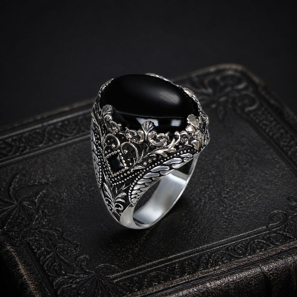 サムネイル： Black Onyx Floral Sterling Silver Men's Ring on a black leather book