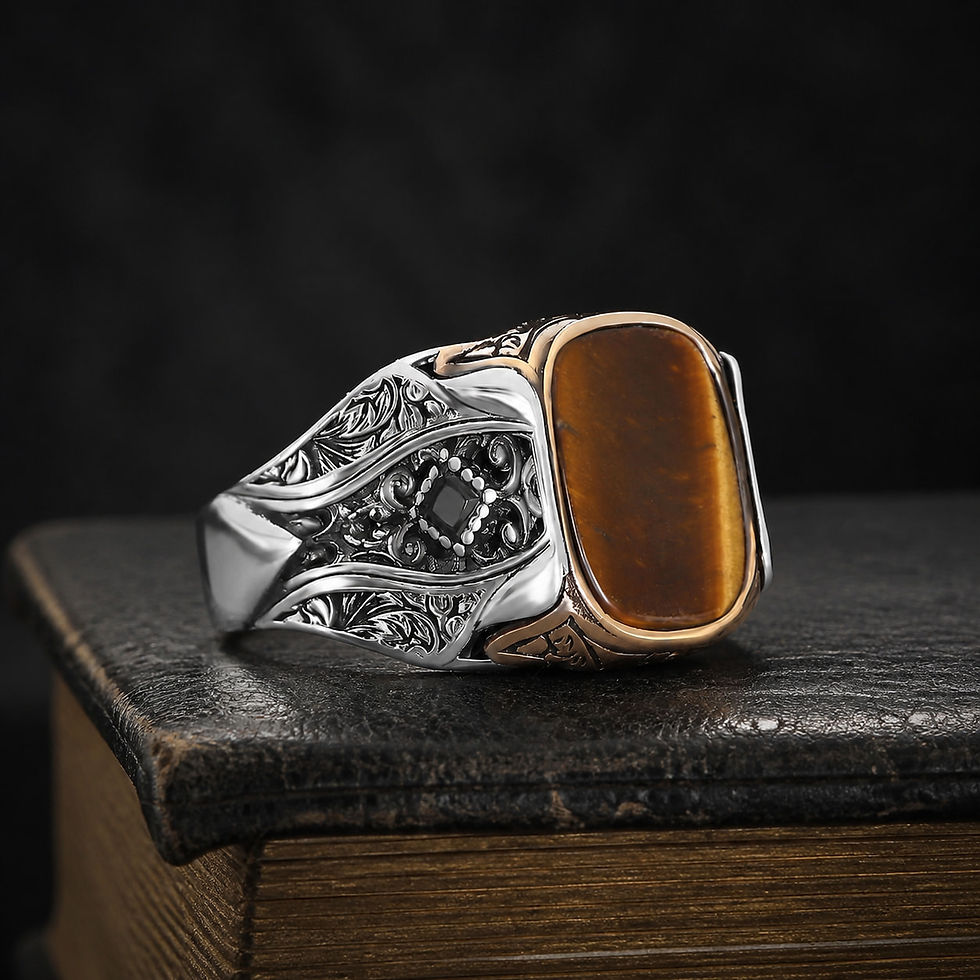 サムネイル： Engraved Brown Tiger Eye Sterling Silver Men's Ring on a black leather book