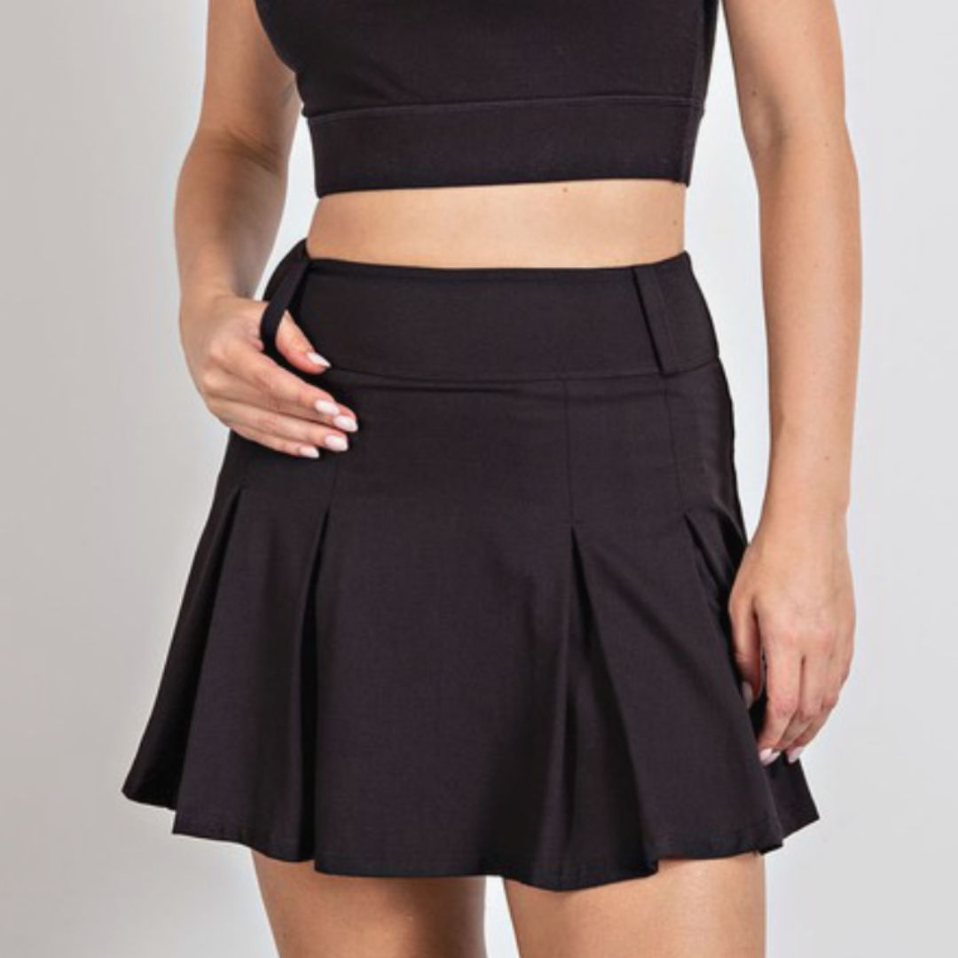 Black butter-soft athletic skort with pleated design and belt loops