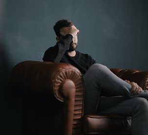 Pensive Man Sitting_edited.png