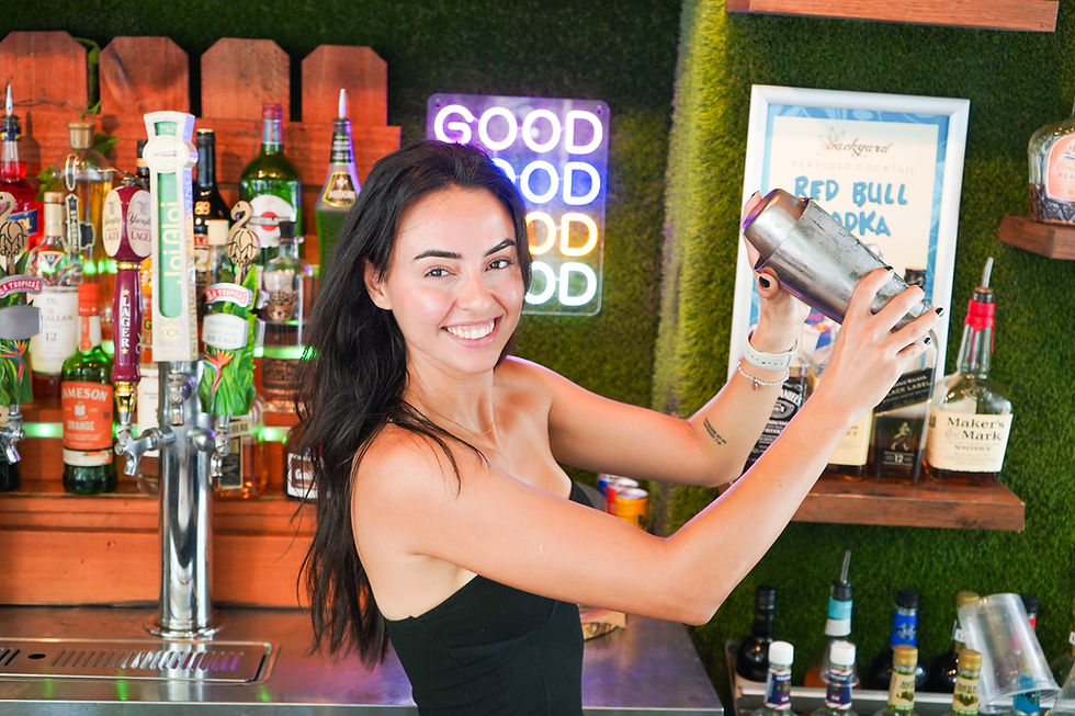 Bartender preparing cocktails at Backyard Miami Beach
