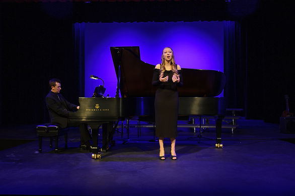 Joseph Welch performs with a singer