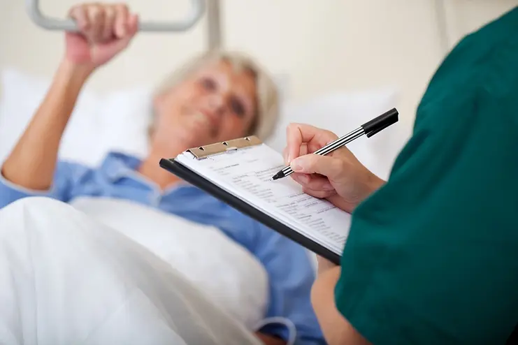 hospital-nurse-patient-document.webp
