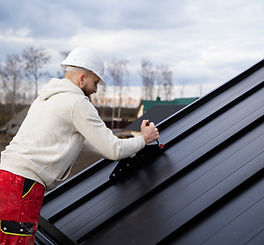 man-working-roof-medium-shot.jpg