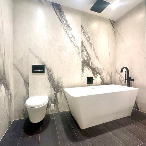 floating toilet free standing tub floor and wall tiles installation