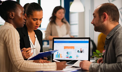 busy-multicultural-diverse-employees-analysing-annual-financial-statistics-sitting-desk-fr