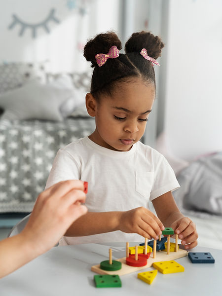 close-up-child-enjoying-didactic-game.jpg