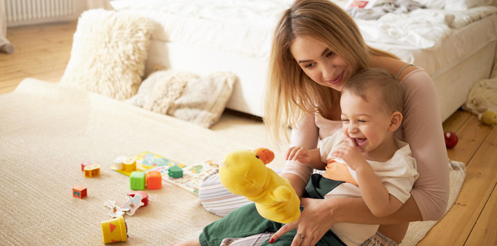 pretty-sister-spending-time-with-her-baby-brother-sitting-floor-bedroom-beautiful-young-babysitter-playing-with-little-boy-indoors-holding-stuffed-toy-duck-infancy-childcare-motherhood.jpg