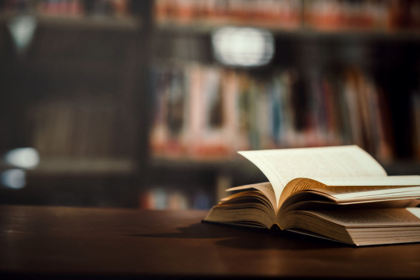 book-library-with-open-textbook.jpg