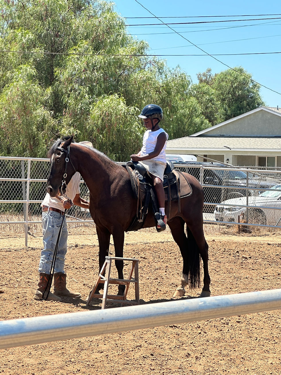 Mr. D and Kid on Zeus with Helmet.jpg