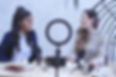 alt=" 2 females talking making a podcat or audio blog"