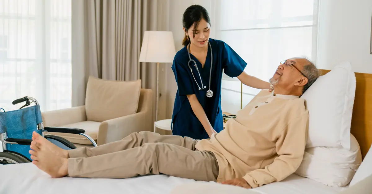 nurse-assisting-patient-postoperative-care-at-home.webp