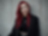 freepik__megs-with-long-bright-red-hair-and-red-lipstick-in__19210_edited_edited.jpg