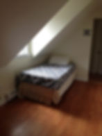 Landing at top of stairs, guest bed