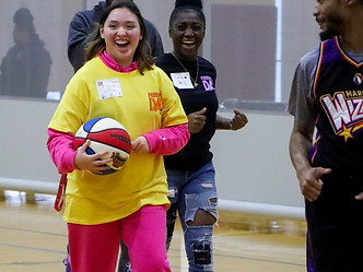 Friend having fun on the basketball court