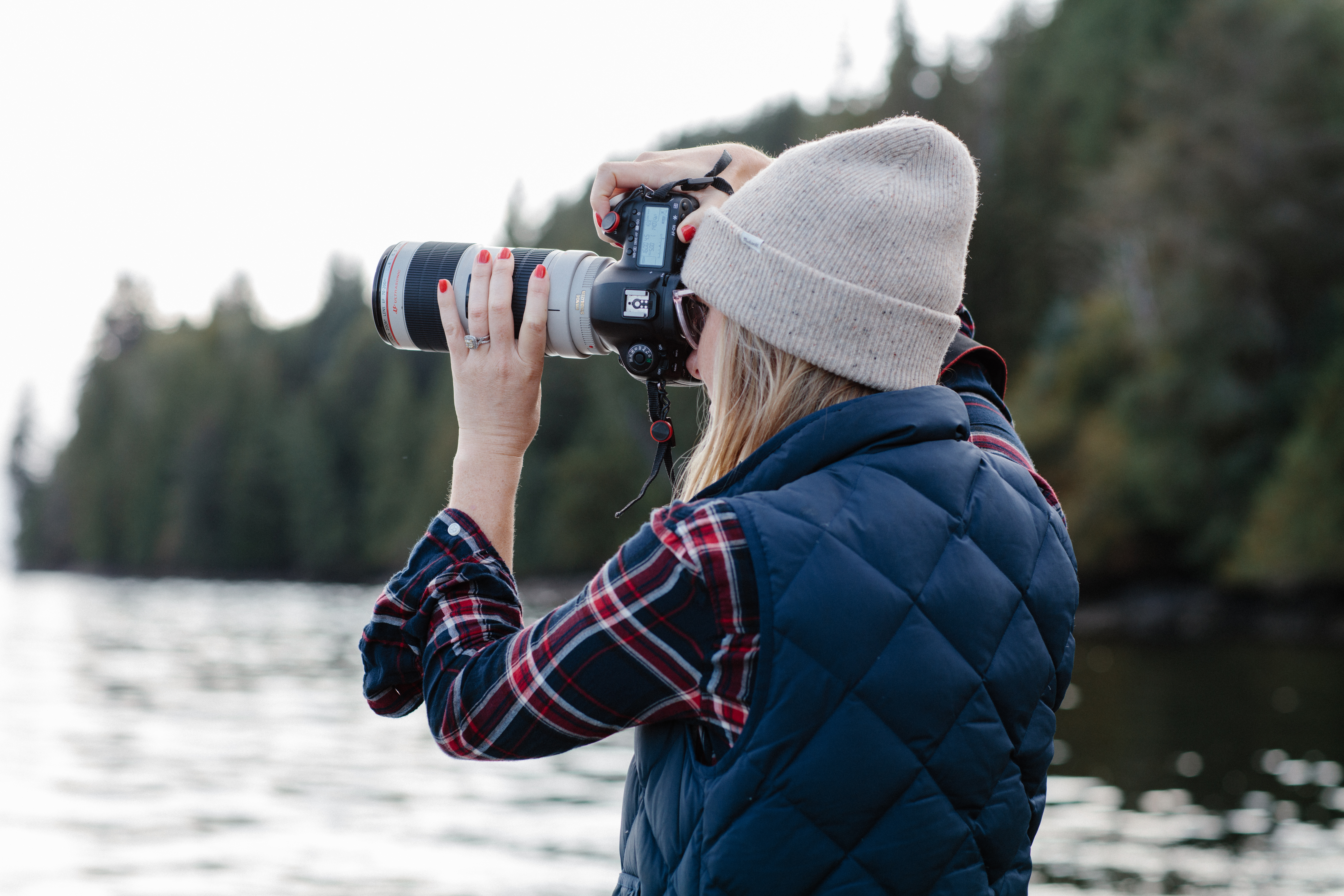 Courtney Ryan with camera in Alaska