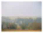 All Saints Church through the early morning haze