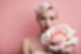beautiful-woman-with-pink-hair-holding-a-rose-ai-generated-free-photo.jpg