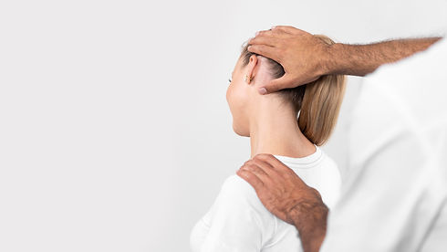male-physiotherapist-checking-woman-s-neck-pain.jpeg