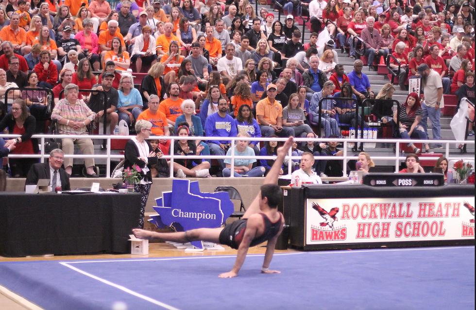 A gymnast showcasing his skills on the floor exercise during a state championship competition.