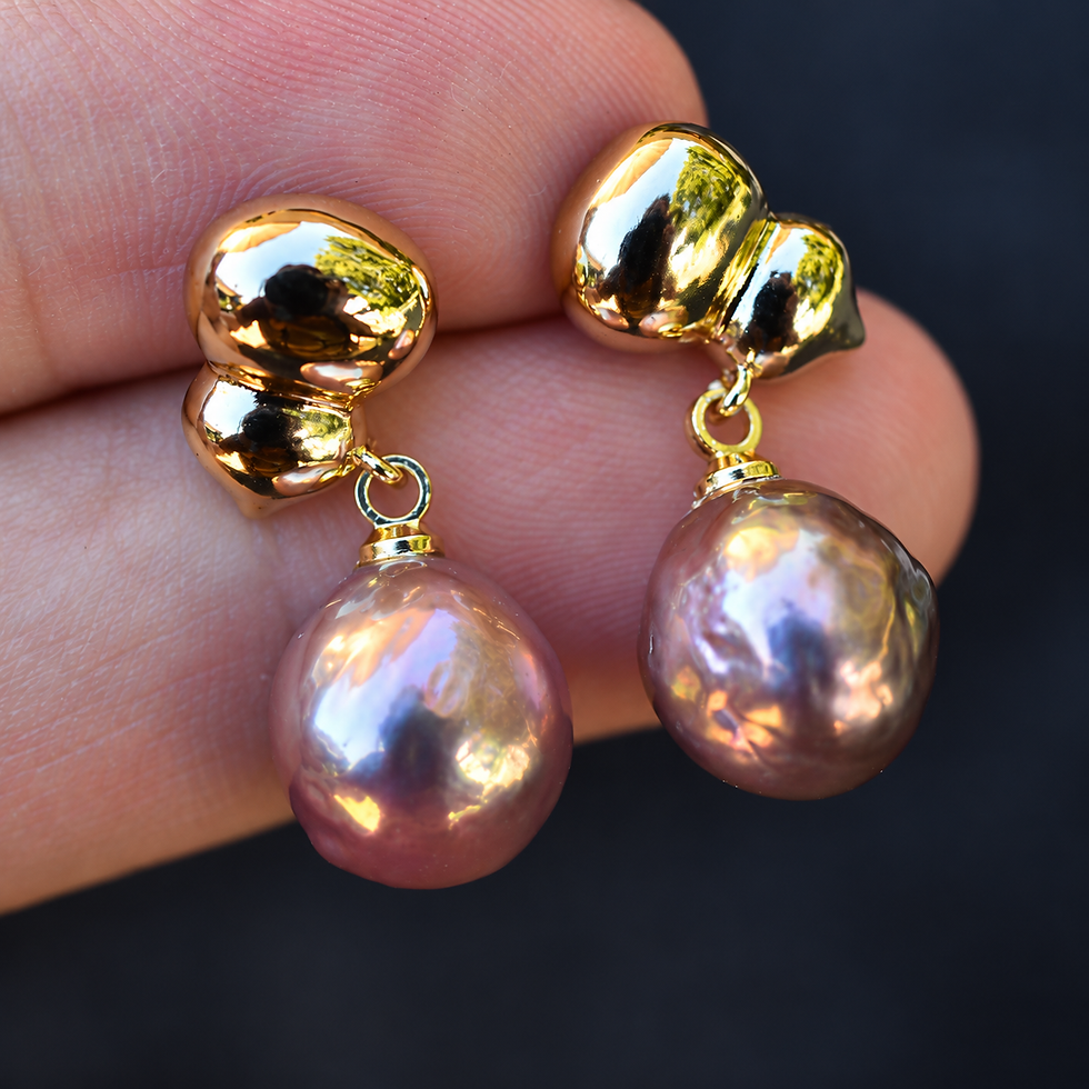Thumbnail: Rainbow lustre and rounded baroque pearl detail