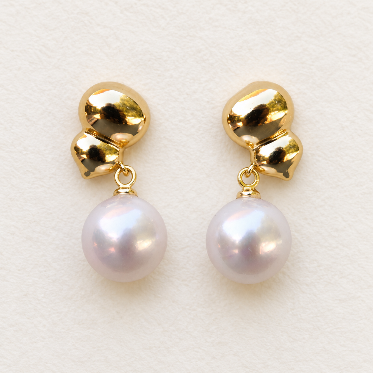 Golden Form freshwater pearl earrings, front view
