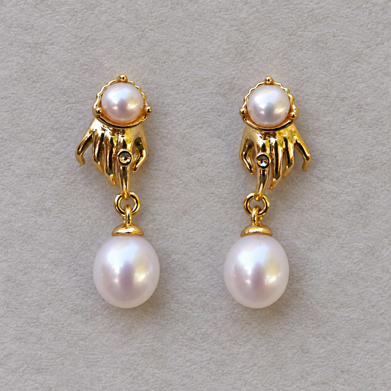 Golden Touch pearl earrings front view