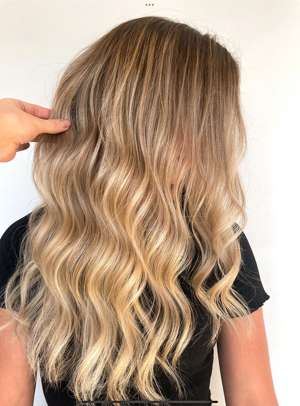 Foto van een haarkleuring, uitgevoerd in het salon in Vichte.