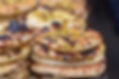 Authentic, flat bread with Za'atar, baked, stacked. The market in Jerusalem. Arab style.
