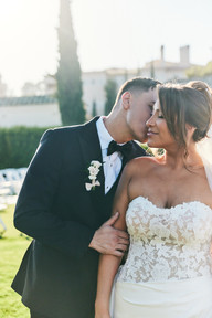 Golden hour portrait of the couple embracing on the golf course in Orange County