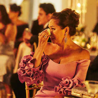 Mother of the bride wiping away tears during heartfelt reception speech at Marbella Country Club