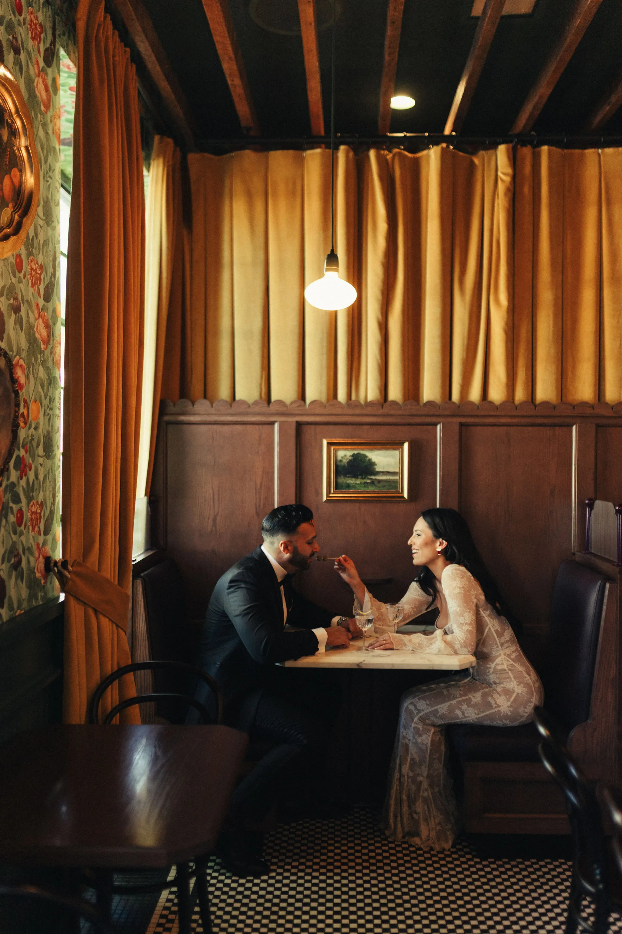 engagement-photo-outfits-restaurant-editorial-warm-light-la