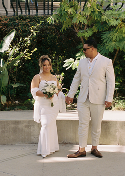 couple looking at camera at the beverly hills city hall 