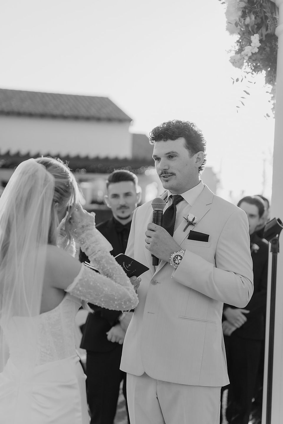 Groom reads his vows to his bride during their Sterling Hills wedding ceremony.